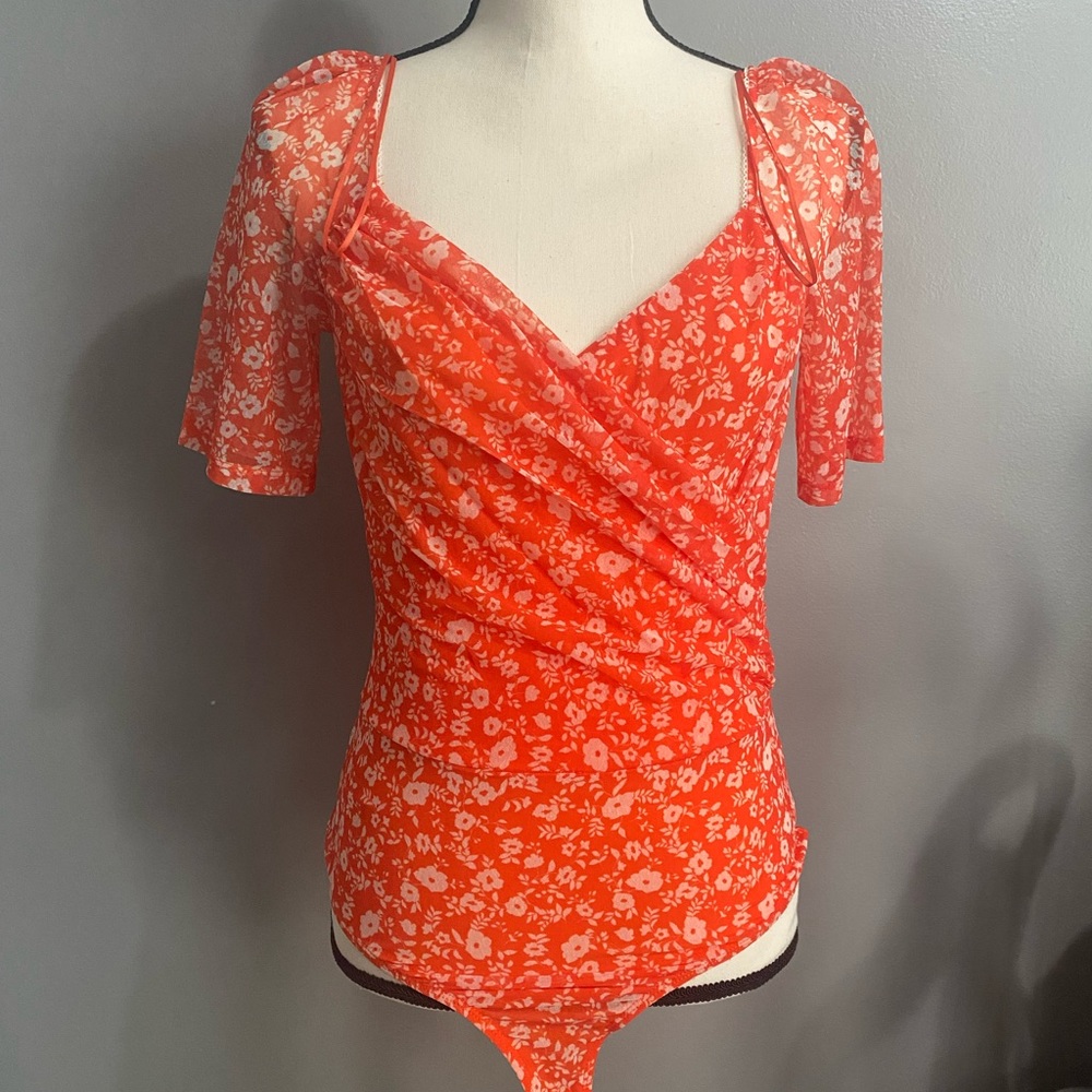 Elodie orange flower bodysuit